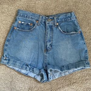 Blue high waisted lightly distressed shorts